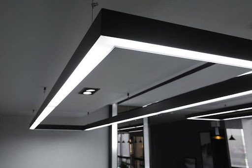 Modern LED ceiling light fixture in a commercial interior